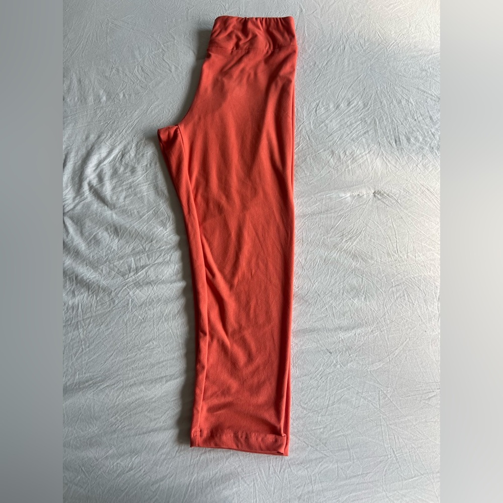 Women’s Time and Tru Orange knee Leggings. Size M (8-10) Used.